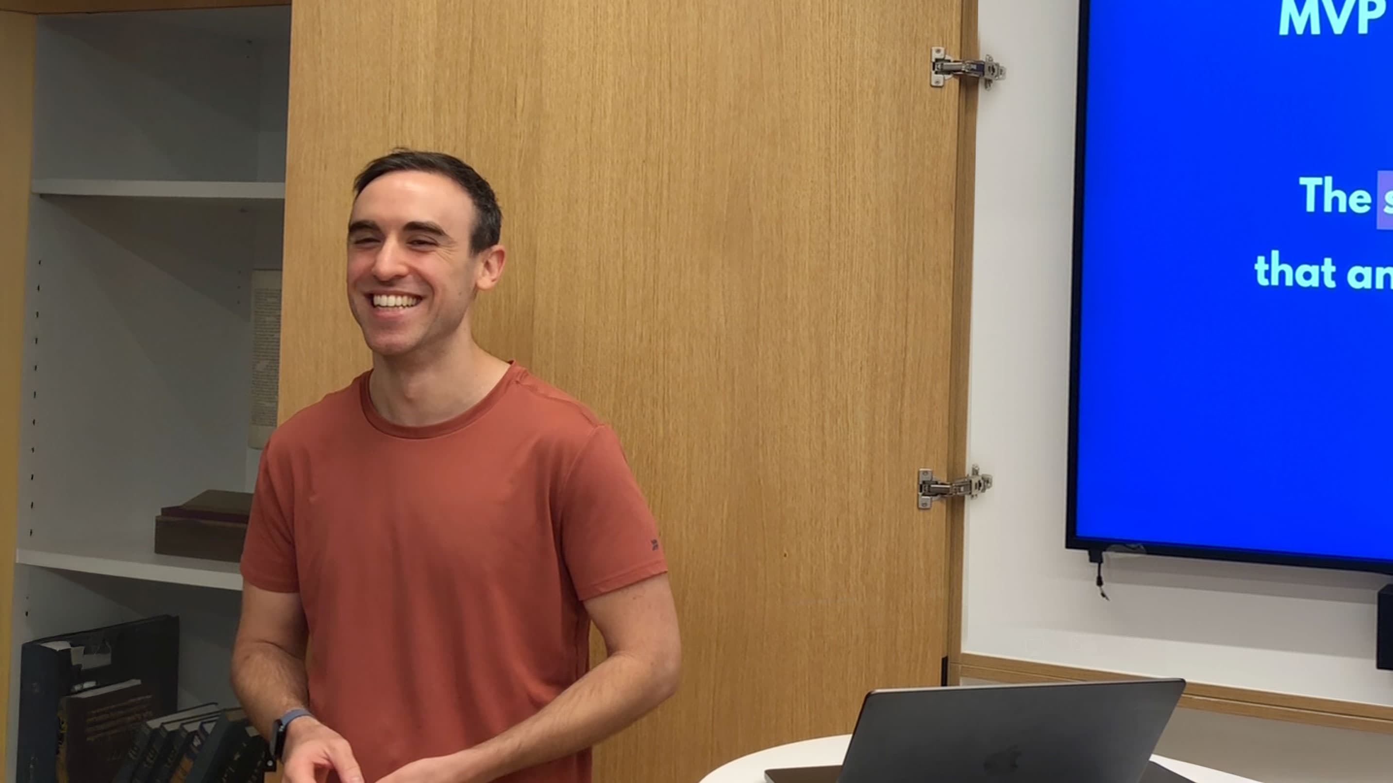 Founder presenting about MVP mistakes at startup bootcamp in Tel Aviv